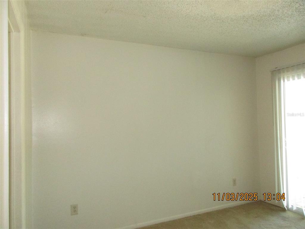 291 Flower Lane, Unit A Kissimmee, FL 34743 - Photo 17 of 40 a view of a small space