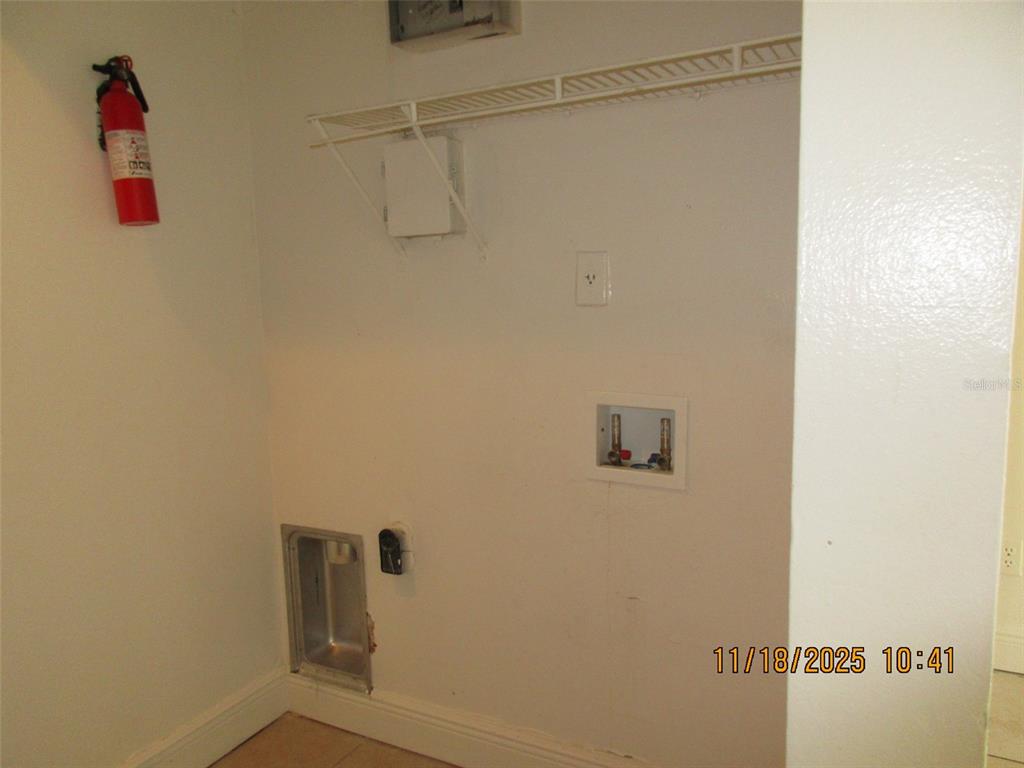 291 Flower Lane, Unit A Kissimmee, FL 34743 - Photo 24 of 40 a bathroom with a shower