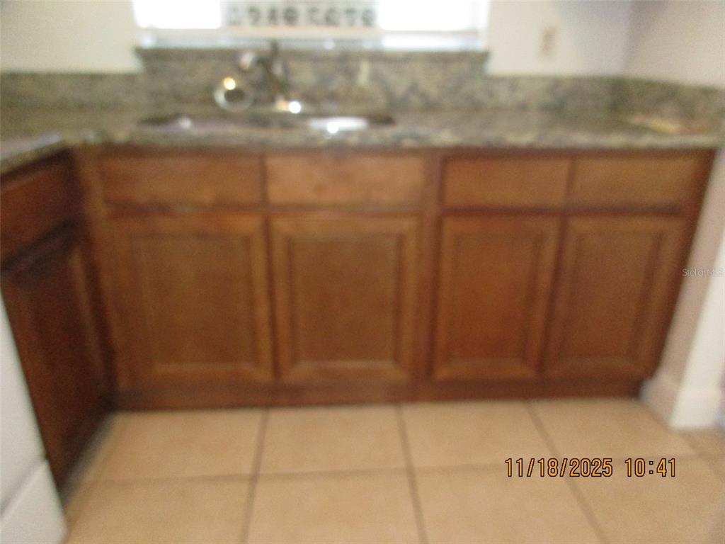 291 Flower Lane, Unit A Kissimmee, FL 34743 - Photo 27 of 40 a view of a shower