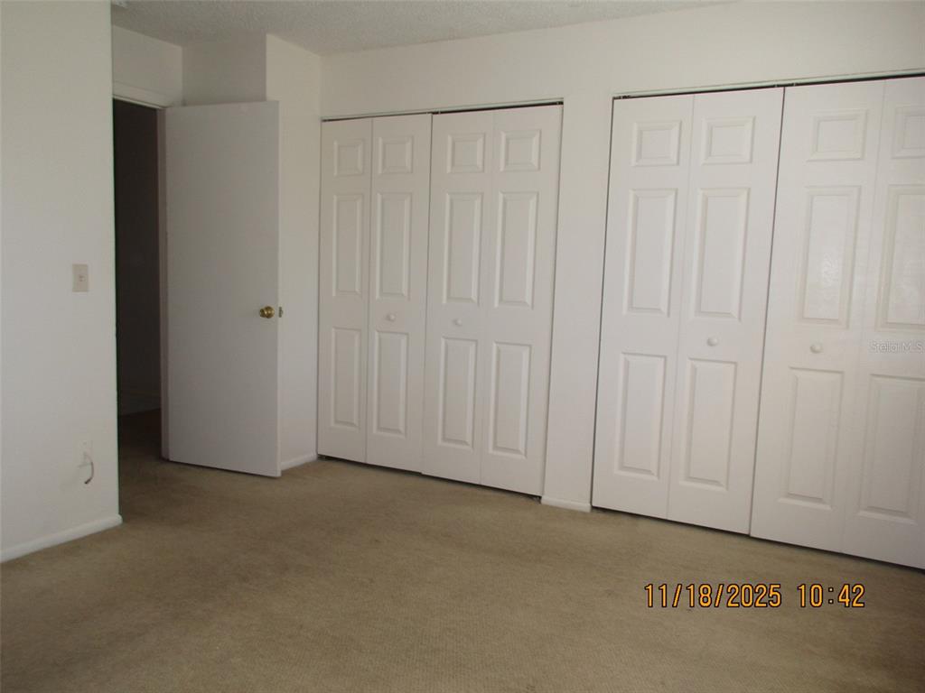 291 Flower Lane, Unit A Kissimmee, FL 34743 - Photo 32 of 40 a view of an empty room