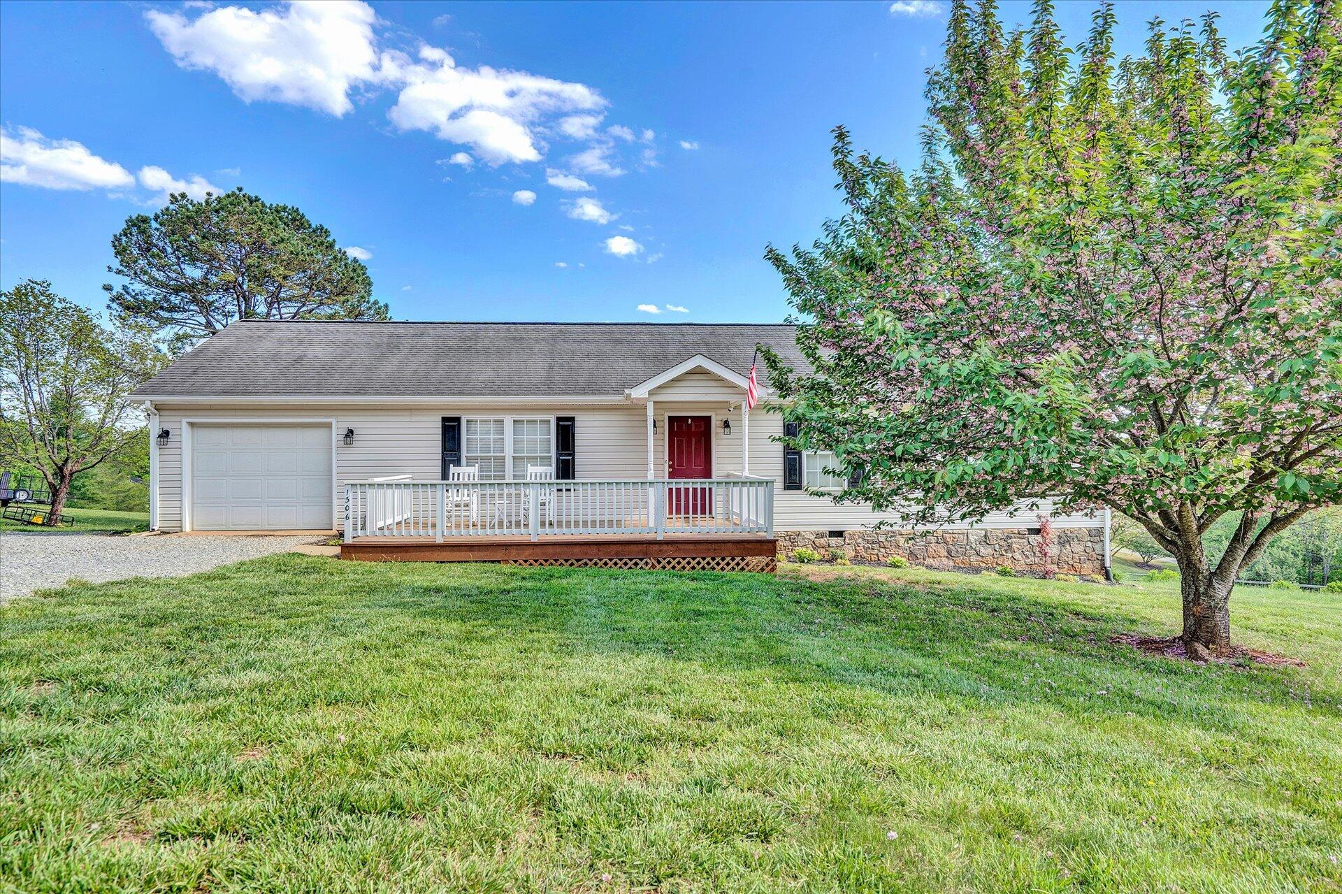 1306 Turner Branch Road Goodview, VA 24095 - Photo 1 of 21 a front view of a house with a yard