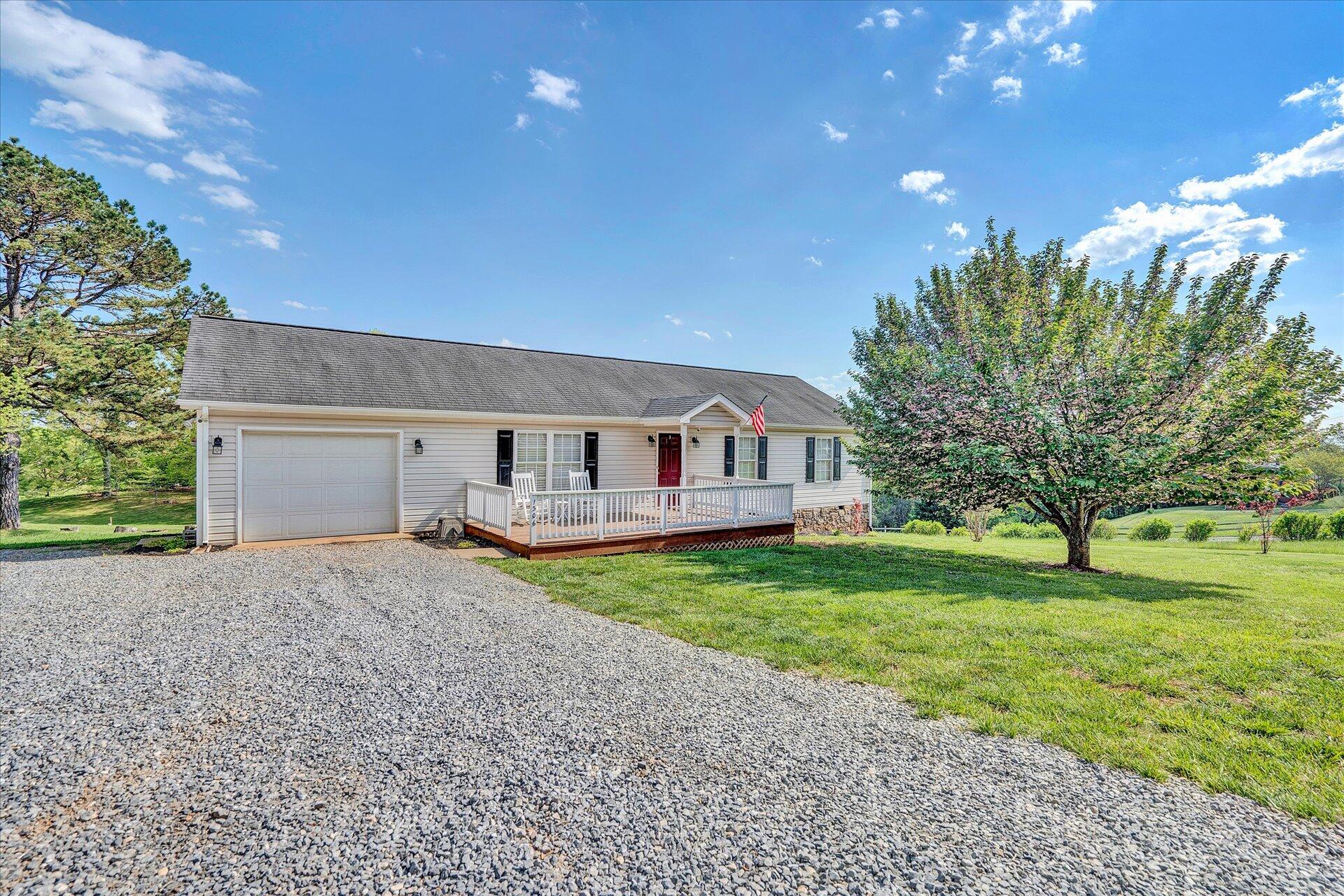 1306 Turner Branch Road Goodview, VA 24095 - Photo 17 of 21 a front view of a house with garden