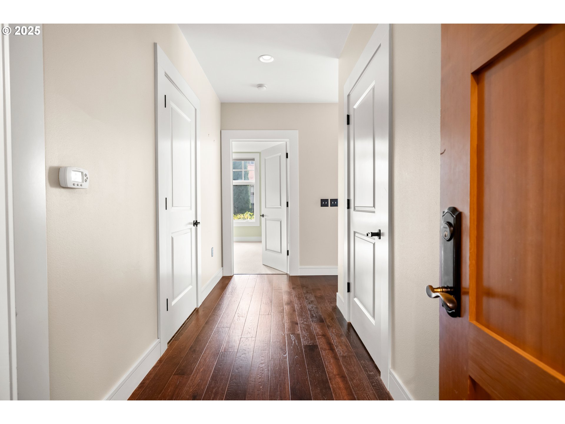 527 2nd Street Lake Oswego, OR 97034 - Photo 6 of 29 a view of a hallway with wooden floor