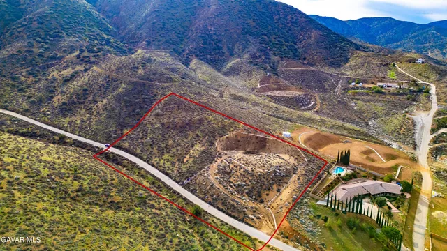 a view of balcony with a small yard