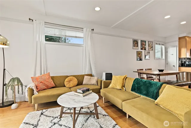 a living room with furniture and a couch