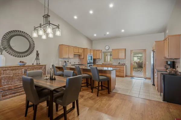 a bedroom with a large bed and furniture