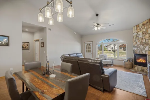 a bedroom with a bed dresser and a window