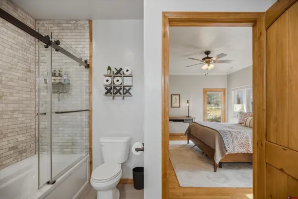 a view of a town with big trees