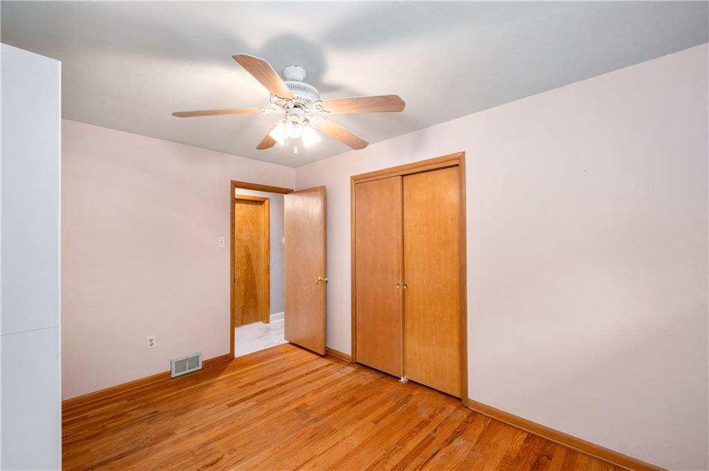 424 Brooks Road Wexford, PA 15090 - Photo 19 of 46 a view of empty room with wooden floor and fan