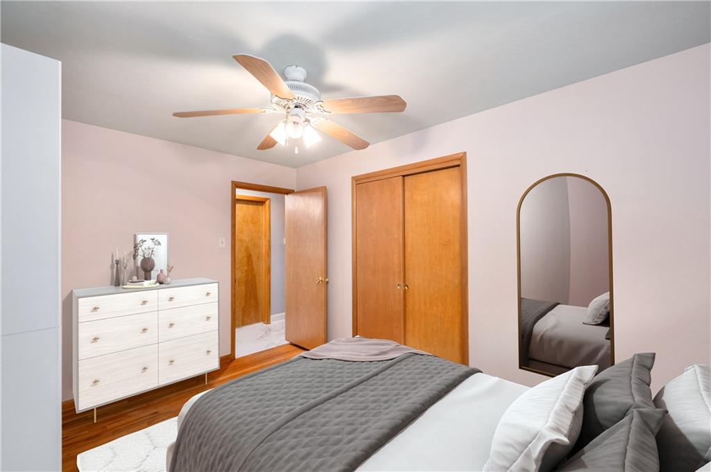 424 Brooks Road Wexford, PA 15090 - Photo 20 of 46 a bedroom with a bed and a chandelier