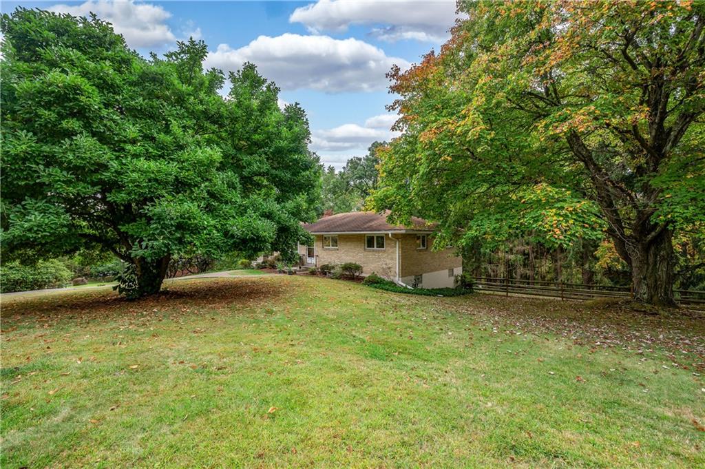 424 Brooks Road Wexford, PA 15090 - Photo 2 of 46 a view of a backyard with a garden