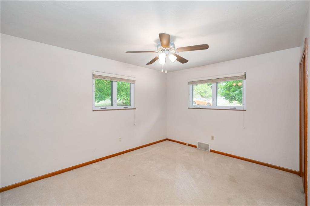 424 Brooks Road Wexford, PA 15090 - Photo 21 of 46 an empty room with windows and fan