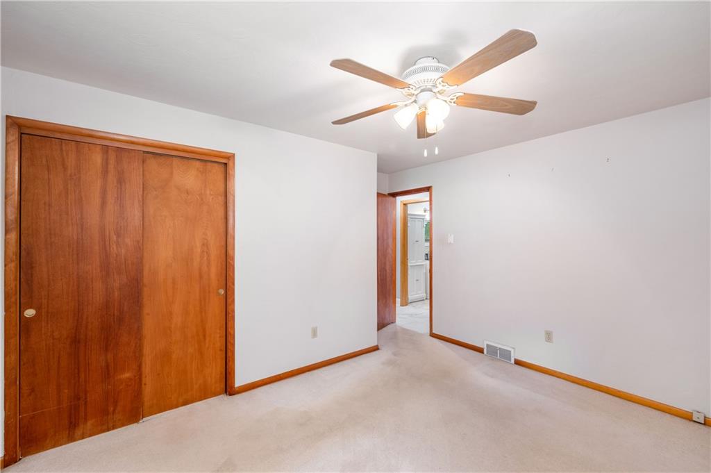 424 Brooks Road Wexford, PA 15090 - Photo 23 of 46 an empty room with closet and fan