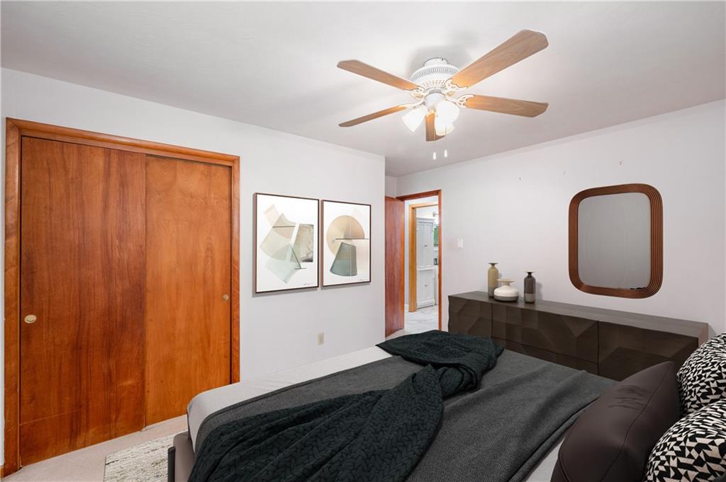 424 Brooks Road Wexford, PA 15090 - Photo 24 of 46 a bedroom with a large bed and ceiling fan