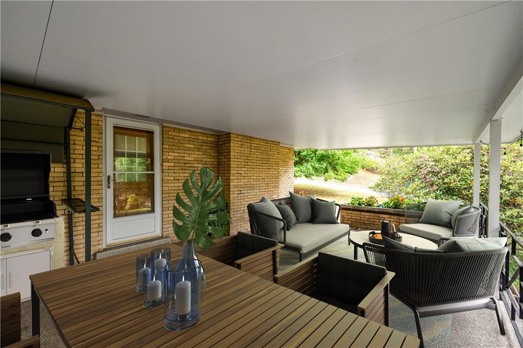 424 Brooks Road Wexford, PA 15090 - Photo 34 of 46 a outdoor living space with furniture and a flat screen tv