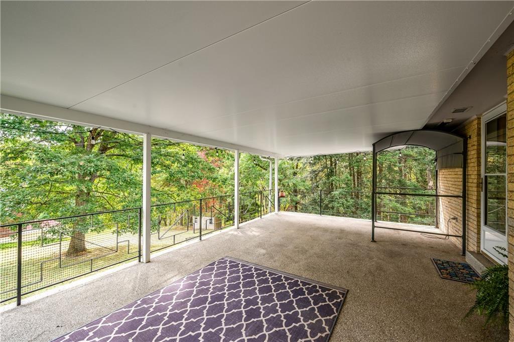 424 Brooks Road Wexford, PA 15090 - Photo 35 of 46 a bedroom with a bed and glass door