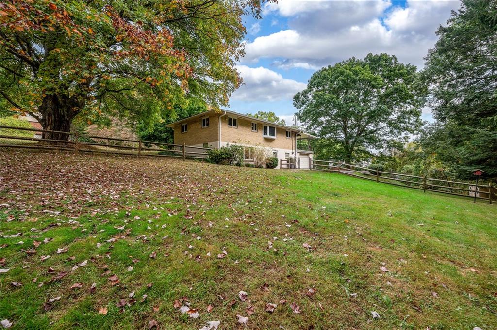 424 Brooks Road Wexford, PA 15090 - Photo 40 of 46 a view of a house with a yard