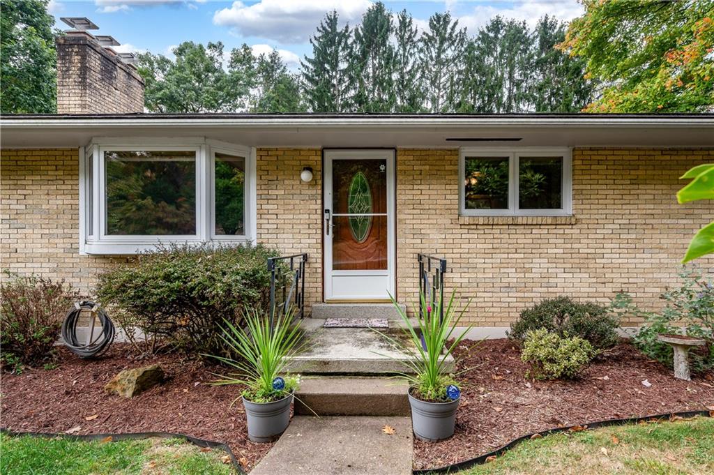 424 Brooks Road Wexford, PA 15090 - Photo 4 of 46 a front view of a house with a yard
