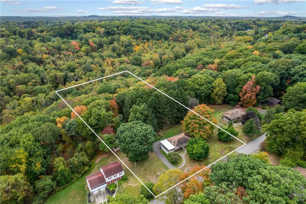 424 Brooks Road Wexford, PA 15090 - Photo 43 of 46 an aerial view of a house with a yard