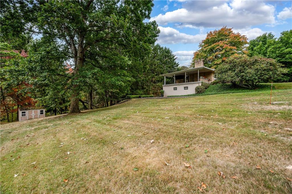 424 Brooks Road Wexford, PA 15090 - Photo 44 of 46 a white house that has a big yard and large trees