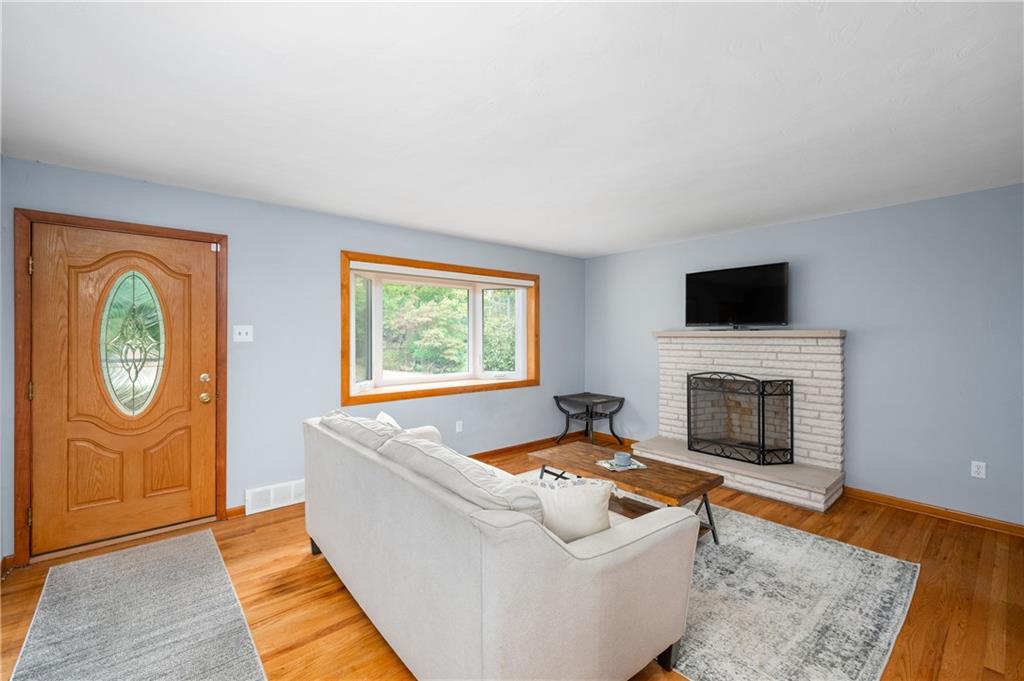 424 Brooks Road Wexford, PA 15090 - Photo 5 of 46 a living room with furniture and a fireplace