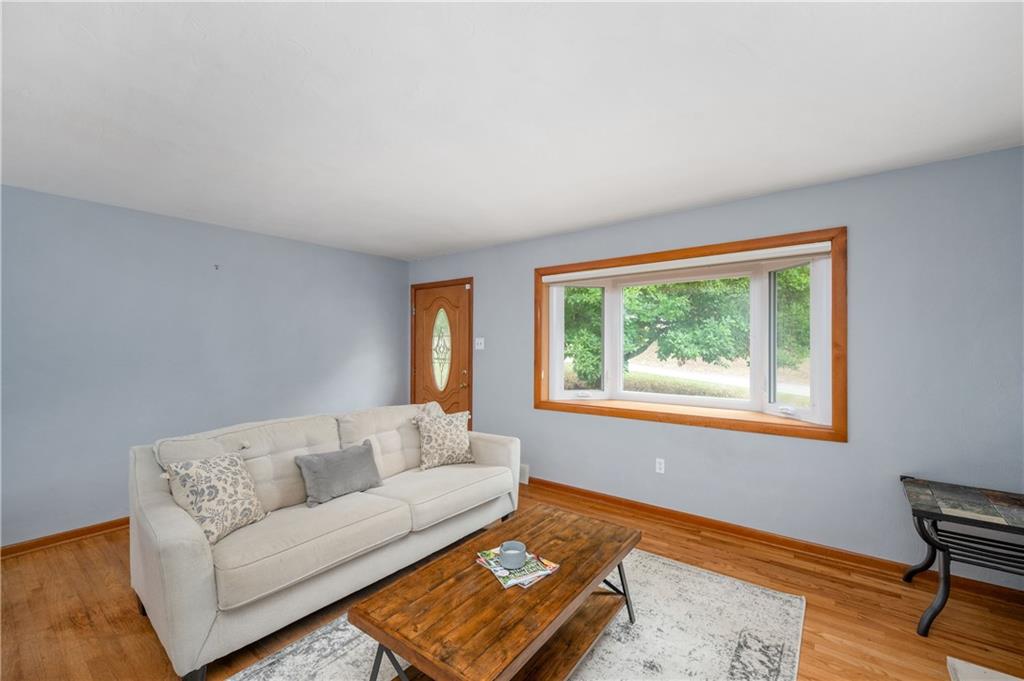 424 Brooks Road Wexford, PA 15090 - Photo 6 of 46 a living room with furniture and a window