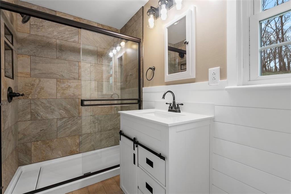 212 Old Rte 8 South Valencia, PA 16059 - Photo 11 of 47 a bathroom with a sink and mirror