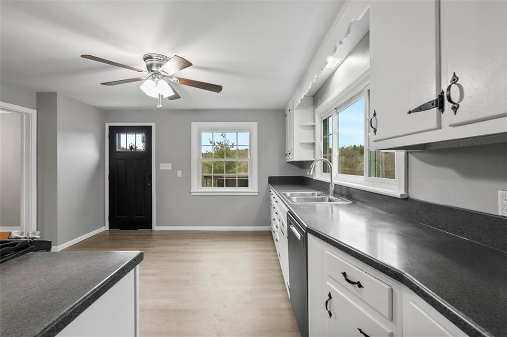 212 Old Rte 8 South Valencia, PA 16059 - Photo 18 of 47 a kitchen with stainless steel appliances granite countertop a sink a stove and a granite counter tops