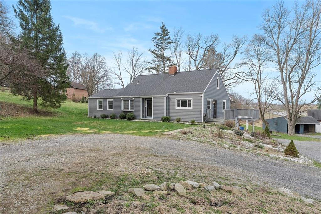 212 Old Rte 8 South Valencia, PA 16059 - Photo 2 of 47 a view of a yard with a house in the background
