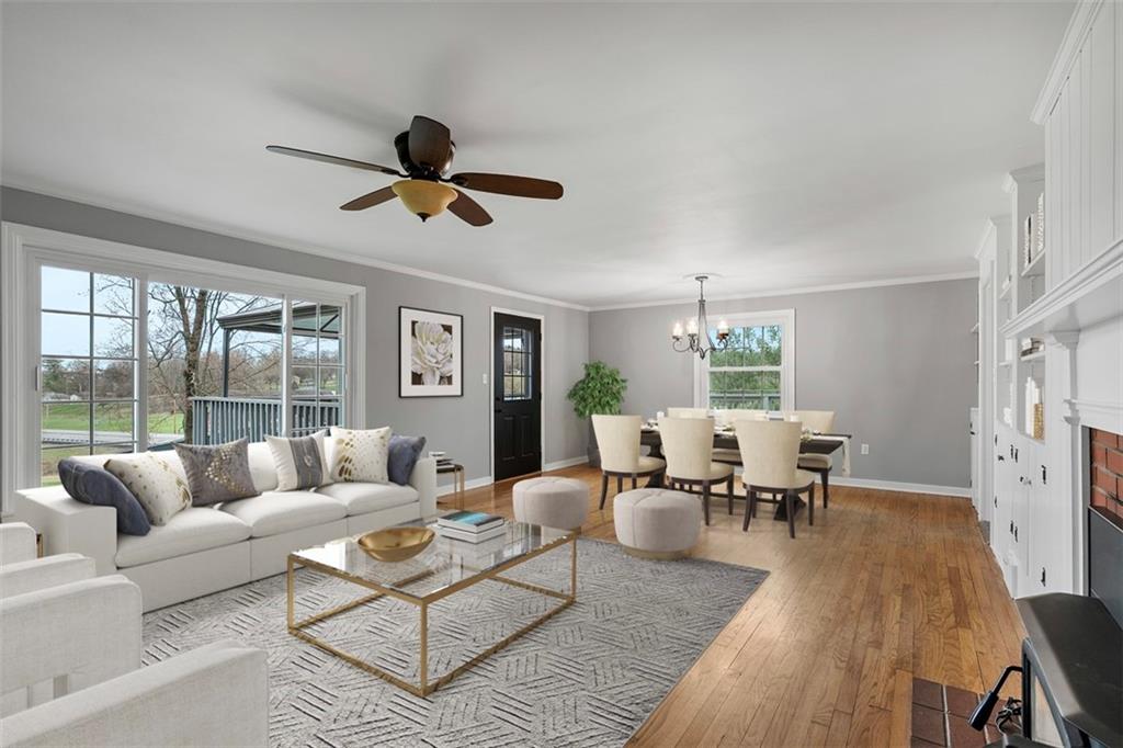 212 Old Rte 8 South Valencia, PA 16059 - Photo 21 of 47 a living room with furniture ceiling fan and a window