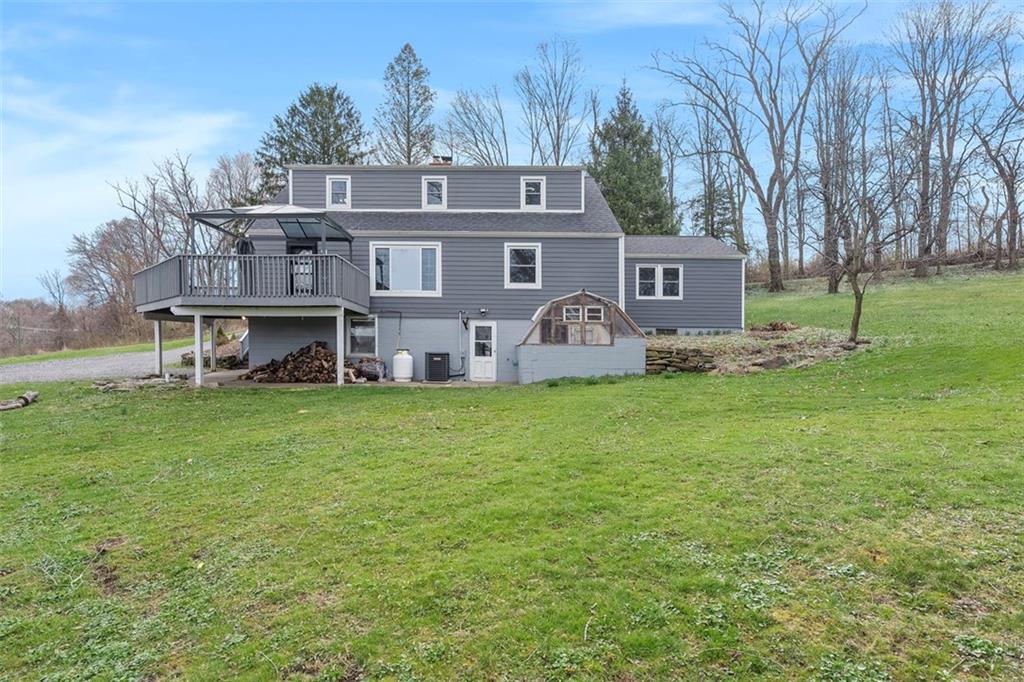 212 Old Rte 8 South Valencia, PA 16059 - Photo 30 of 47 a front view of house with yard and trees in the background