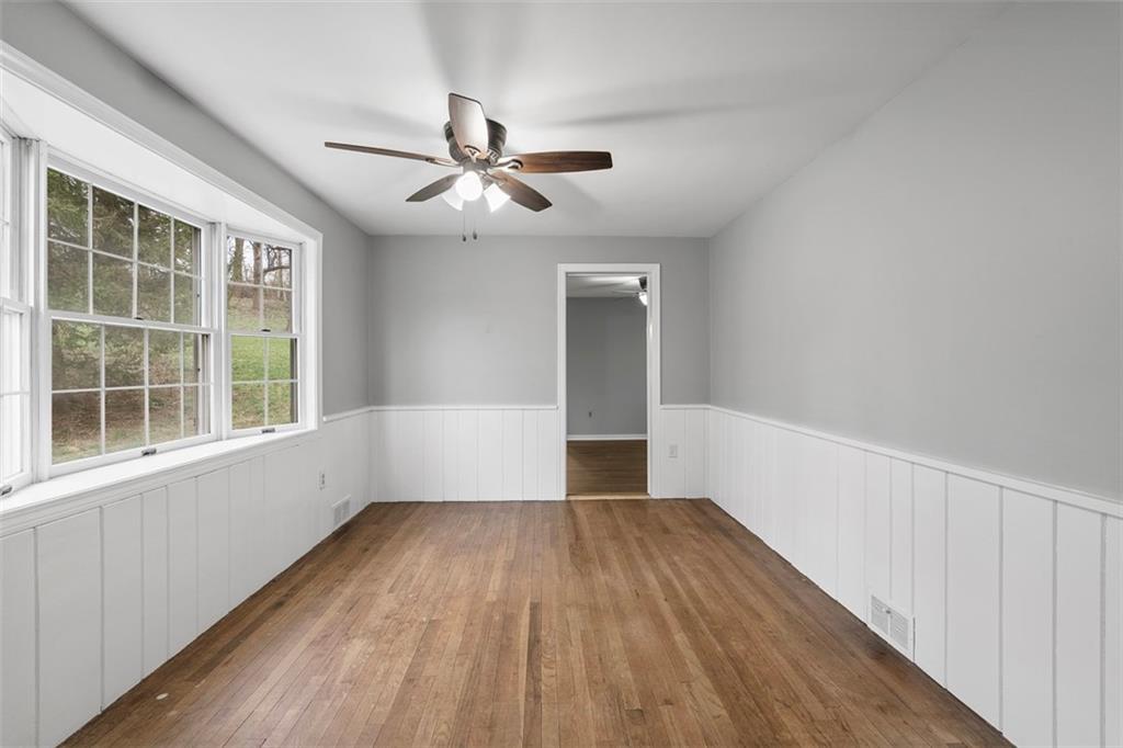 212 Old Rte 8 South Valencia, PA 16059 - Photo 7 of 47 a view of empty room with wooden floor and fan