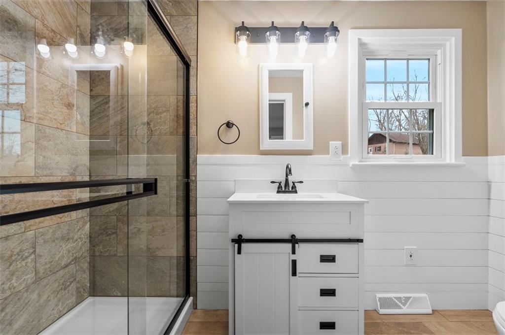 212 Old Rte 8 South Valencia, PA 16059 - Photo 10 of 47 a bathroom with a sink a mirror and shower