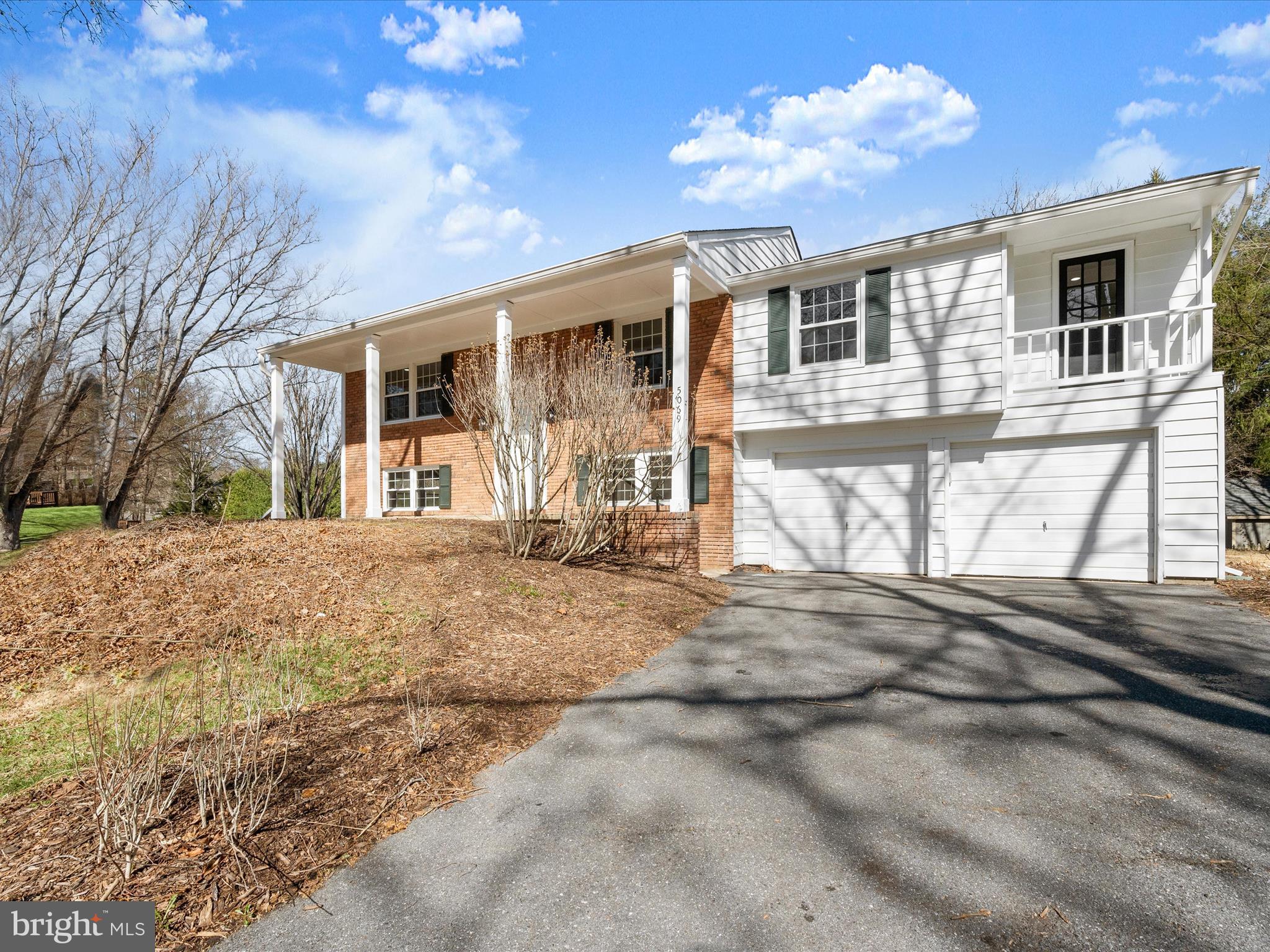 5069 West Running Brook Road Columbia, MD 21044 - Photo 7 of 46 Spacious 2-car garage & expansive driveway