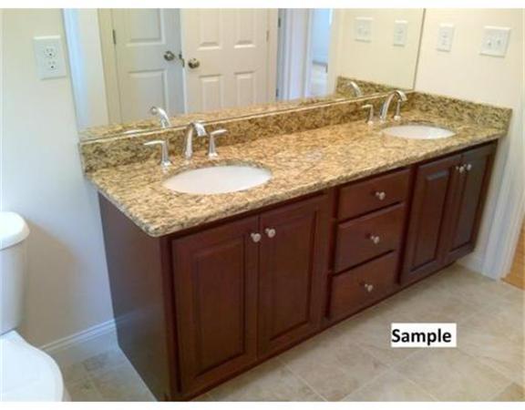 11 Algonquin Road Chelmsford, MA 01824 - Photo 8 of 12 a bathroom with a granite countertop sink and a mirror