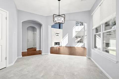 a view of living room with furniture and a window