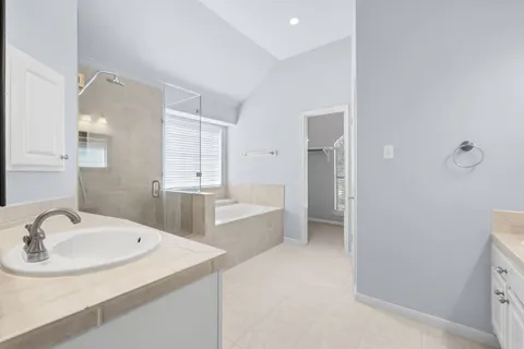 a bathroom with a sink and a bathtub