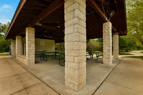 a view of steet with patio