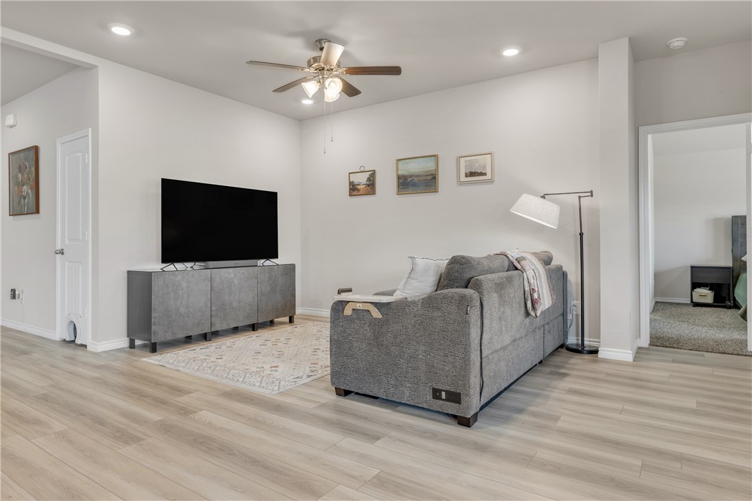 2016 Chief Street Bryan, TX 77807 - Photo 9 of 30 a living room with furniture and a flat screen tv