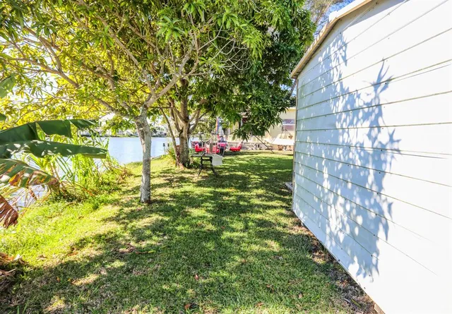 a view of a back yard of the house