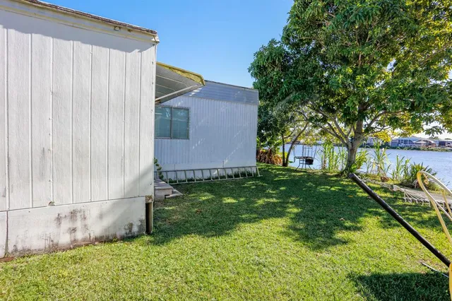 a view of a back yard of the house