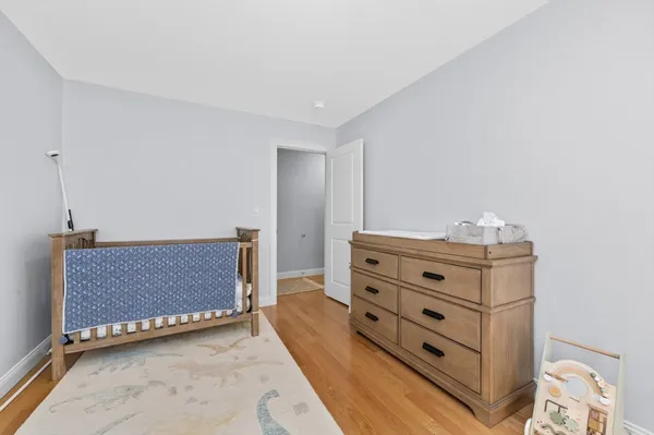 a room with furniture and a night stand