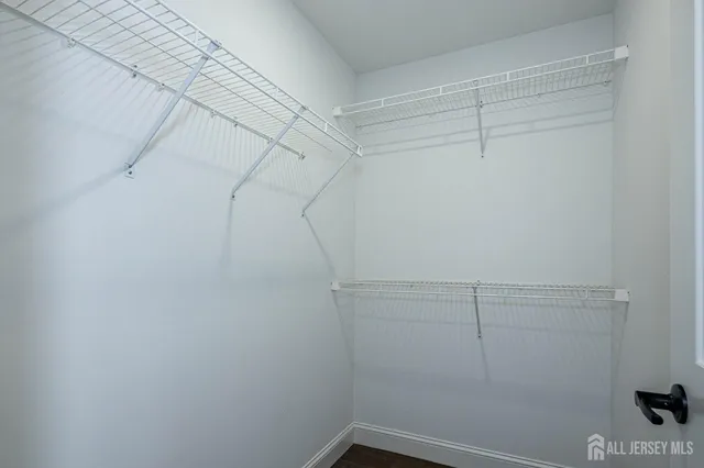 a view of a room with racks on the wall