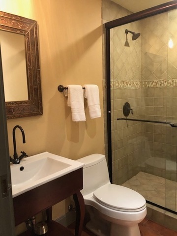 200 Oak Terrace Lake Bluff, IL 60044 - Photo 12 of 18 a bathroom with a sink mirror toilet and shower