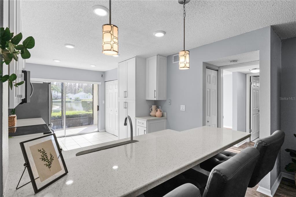 4515 Whitton Way, Unit 117 New Port Richey, FL 34653 - Photo 13 of 35 a living room with furniture and a potted plant