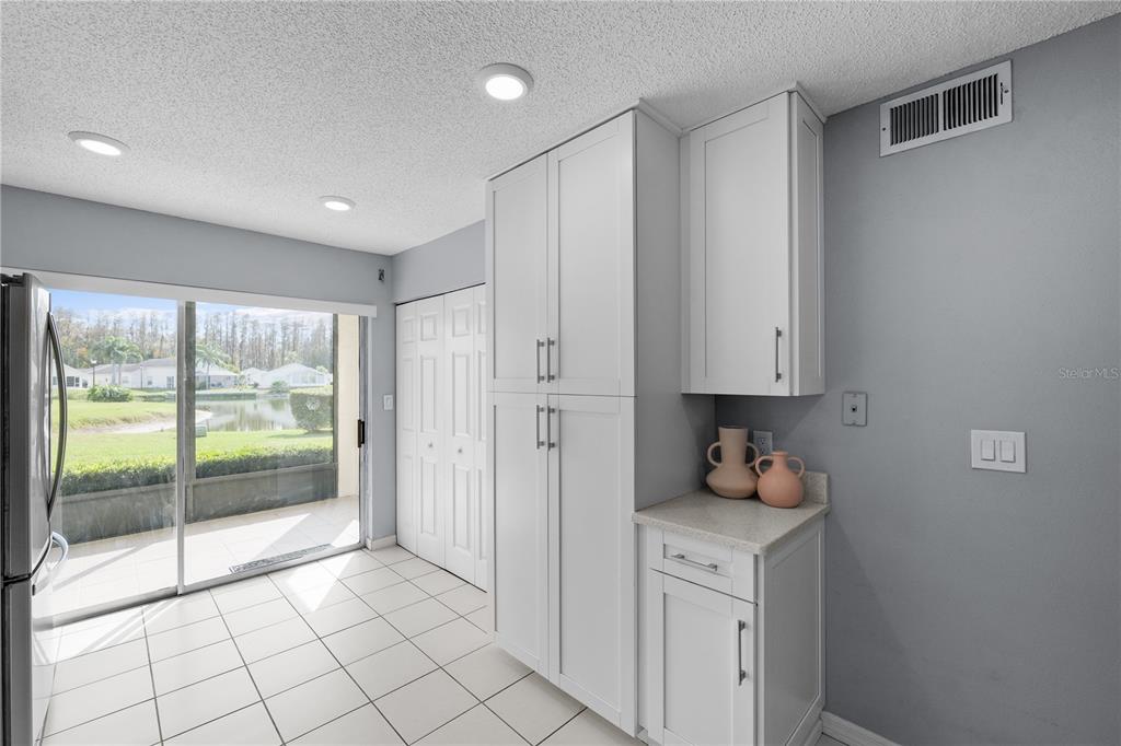 4515 Whitton Way, Unit 117 New Port Richey, FL 34653 - Photo 17 of 35 a view of cabinets and window