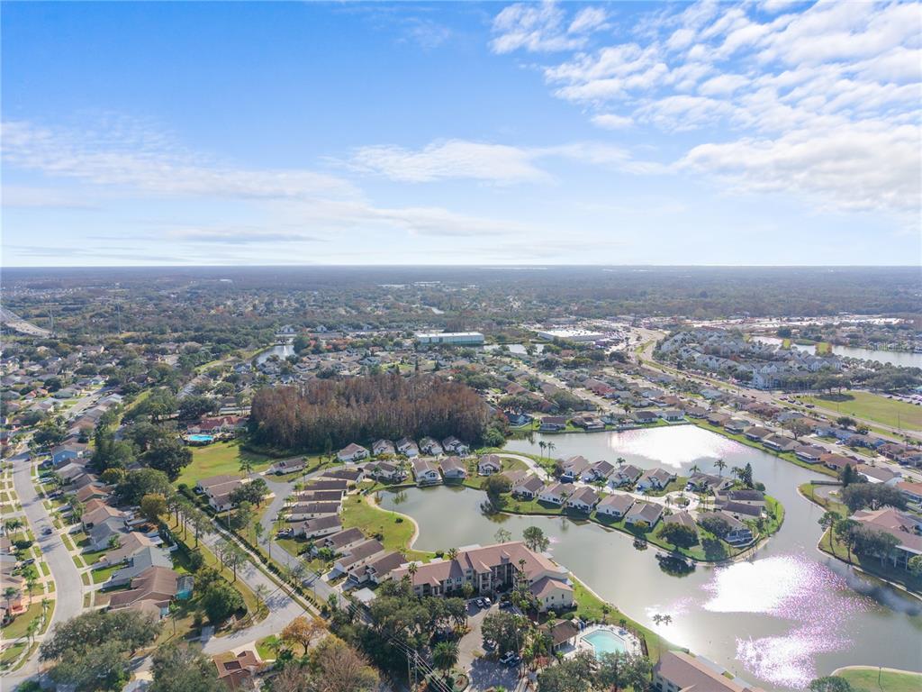 4515 Whitton Way, Unit 117 New Port Richey, FL 34653 - Photo 29 of 35 an aerial view of residential houses with outdoor space