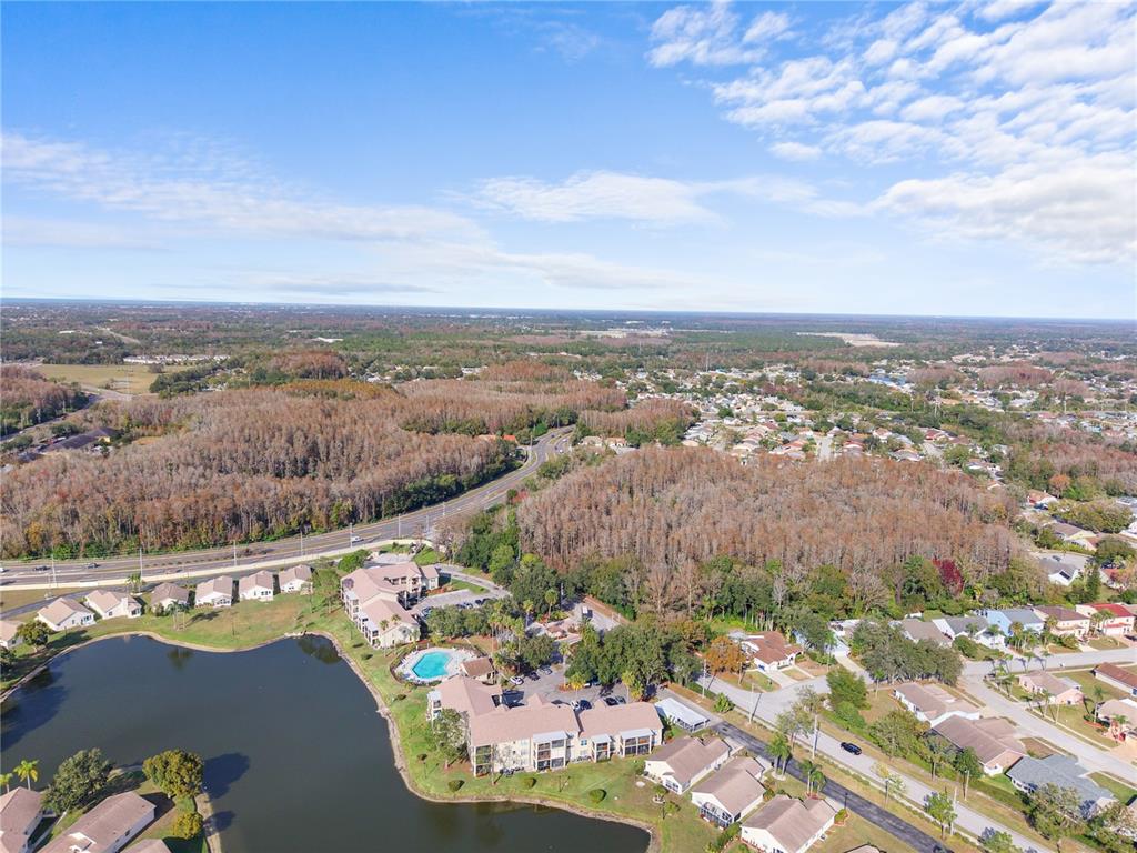 4515 Whitton Way, Unit 117 New Port Richey, FL 34653 - Photo 32 of 35 an aerial view of a city