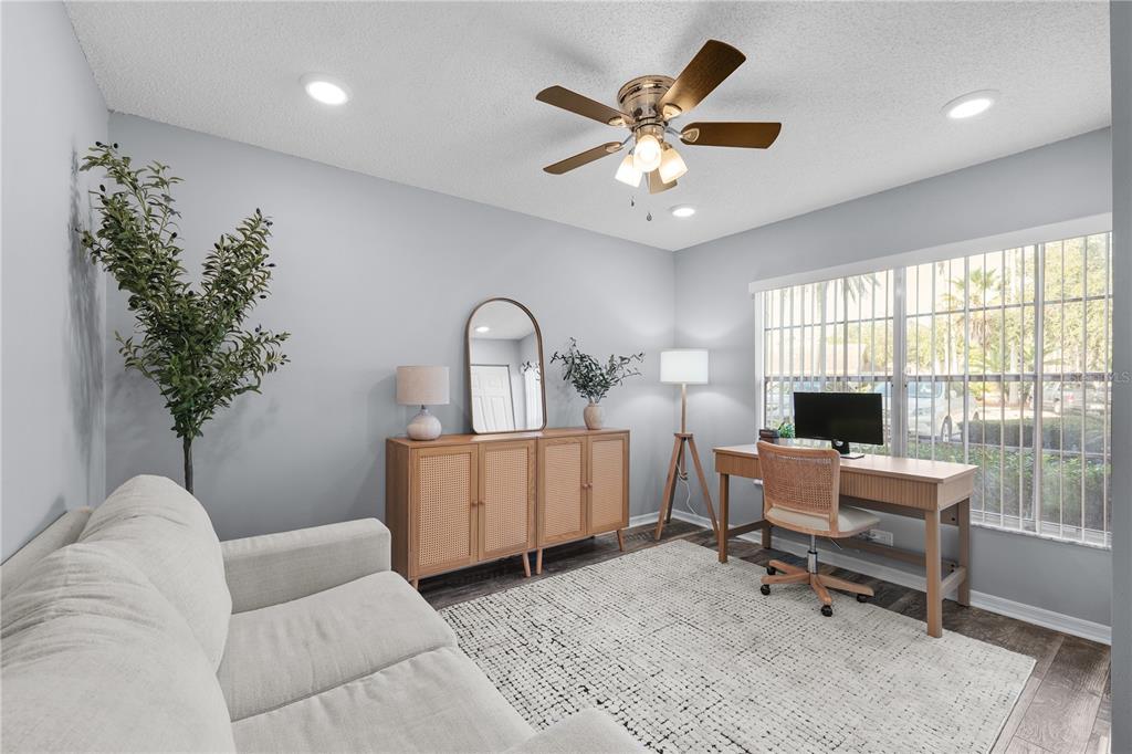 4515 Whitton Way, Unit 117 New Port Richey, FL 34653 - Photo 7 of 35 a living room with furniture