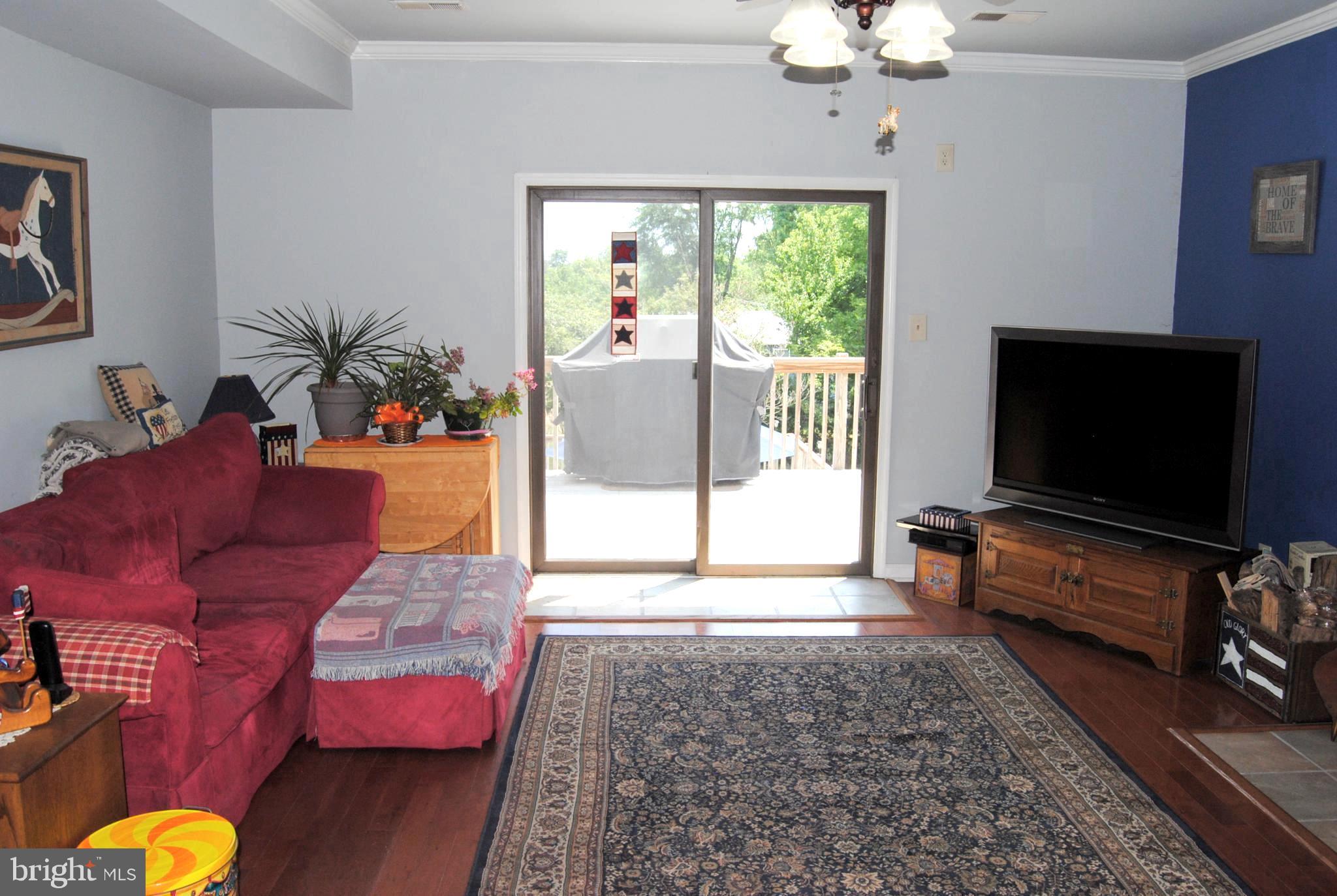 716 Meadowlark Road Norristown, PA 19403 - Photo 11 of 23 Family Room with access to the deck